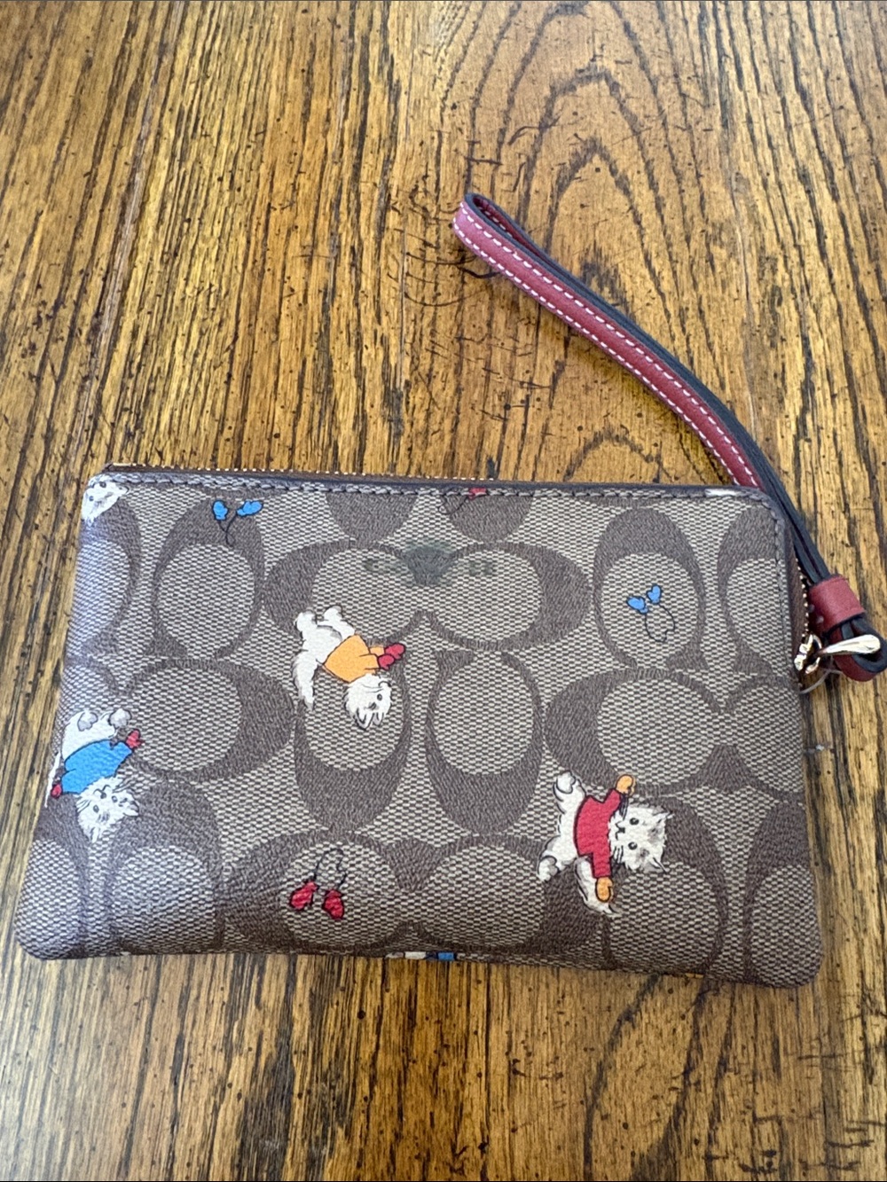Coach Kittens in mittens Brown Signature Wristlet